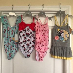 Set of 4 BRAND NEW Disney bathing suits - Size 7/8